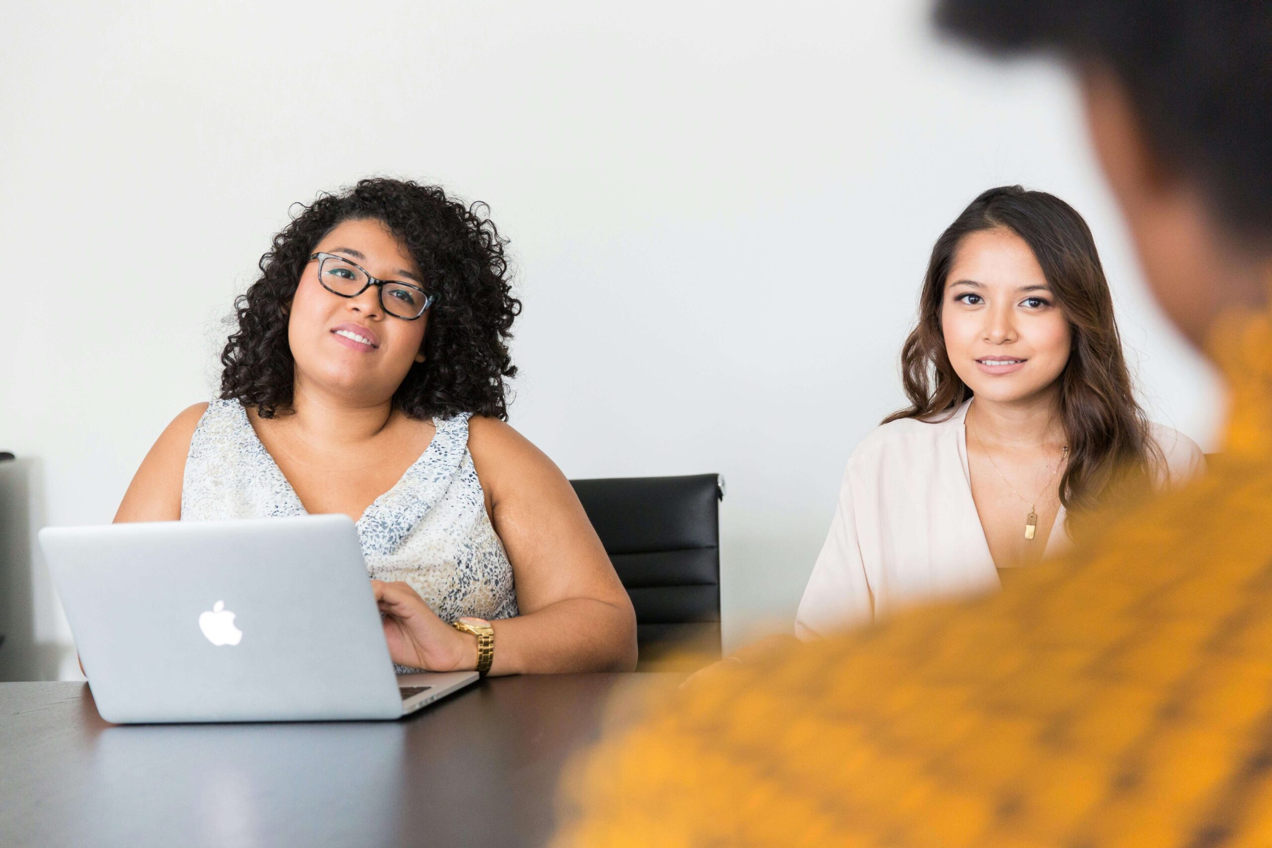 women discussing strategic career planning